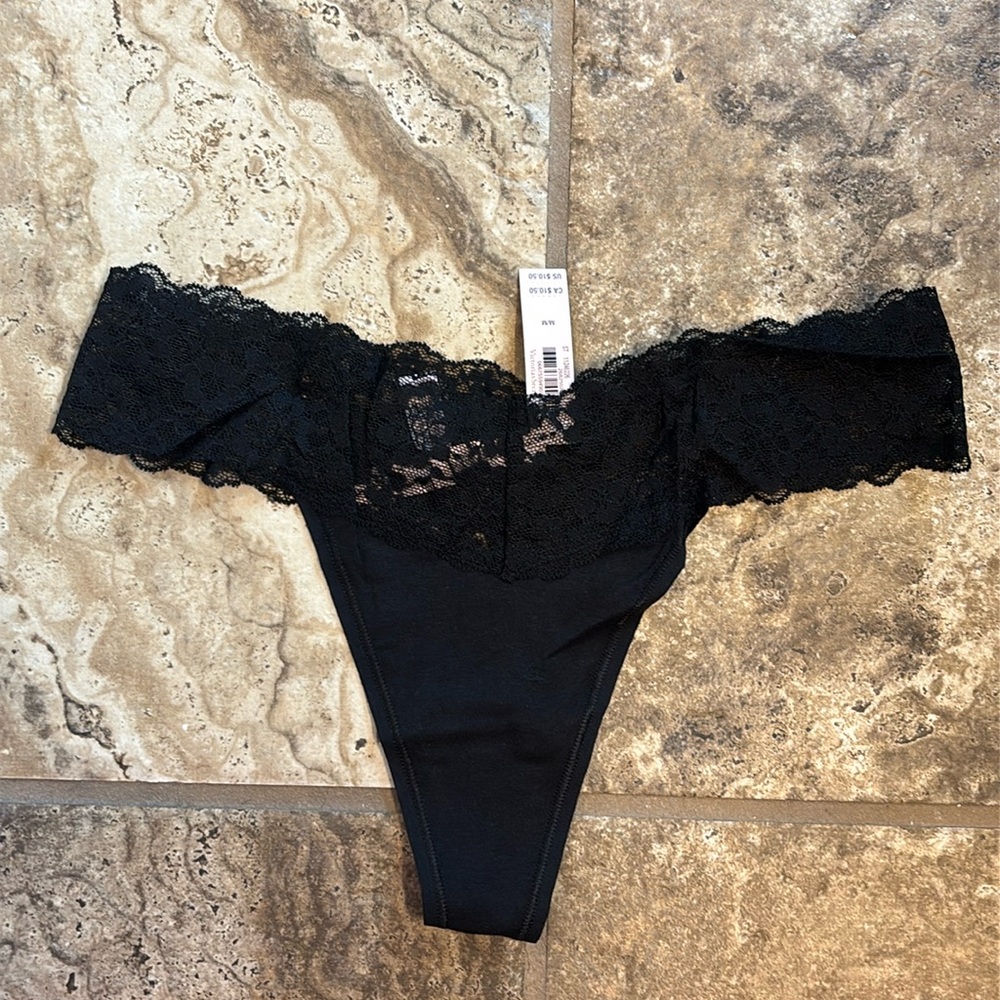 NWT, set of 10 Medium Victorias Secret lace thong.